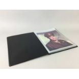 AN ALBUM OF SIGNED PHOTOGRAPHS