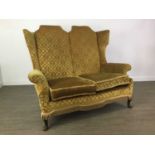 A WING BACKED LOUNGE SETTEE AND A PAIR OF ARMCHAIRS