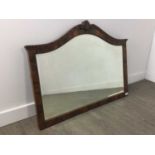 AN EARLY 20TH CENTURY WALNUT WALL MIRROR