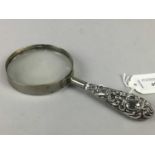 AN EDWARDIAN SILVER HANDLED MAGNIFYING GLASS