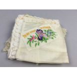 AN EARLY TO MID 20TH CENTURY NAVAL HANDKERCHIEF AND OTHER TEXTILES