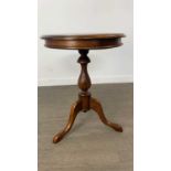 A MAHOGANY CIRCULAR TABLE