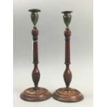 A PAIR OF 19TH CENTURY MAHOGANY CANDLESTICKS