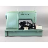 A CASED SINGER SEWING MACHINE