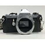 A PENTAX ME SLR CAMERA WITH ACCESSORIES