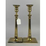 A PAIR OF BRASS CANDLESTICKS AND OTHER OBJECTS