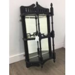 A VICTORIAN EBONISED HANGING WALL RACK