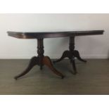 A MAHOGANY TWIN PEDESTAL EXTENDING DINING TABLE WITH SIX CHAIRS