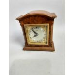 AN ELLIOTT WALNUT MANTEL CLOCK