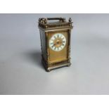 A BRASS CASED CARRIAGE CLOCK