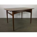 A 1960S TEAK EXTENDING DINING TABLE AND SIX CHAIRS