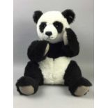 A LARGE MODERN STEIFF SEATED PANDA AND A FABRIC BAG