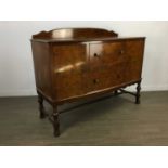 A WALNUT BOW FRONT SIDEBOARD