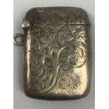 THREE SILVER CIGARETTE CASES AND A VESTA CASE