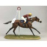 A DANBURY MINT FIGURE OF 'RED RUM' ALONG WITH ANOTHER CERAMIC HORSE FIGURE