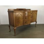 A WALNUT BOWFRONT SIDEBOARD