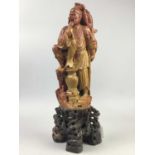 A PAIR OF CHINESE SOAPSTONE CARVINGS OF FISHERMEN AND ANOTHER