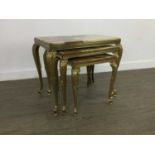 A NEST OF THREE BRASS ONYX TABLES