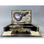 A SILVER FOUR PIECE VANITY SET IN FITTED BOX AND ANOTHER VANITY BOX