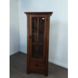 A MODERN OAK NARROW DISPLAY CABINET