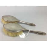 AN EARLY 20TH CENTURY SILVER FOUR PIECE VANITY SET