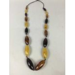 SIMULATED AMBER BEADS AND OTHER NECKLACES