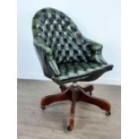 A GREEN BUTTON BACK SWIVEL OFFICE CHAIR