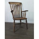 A VICTORIAN SPAR BACK ELBOW CHAIR