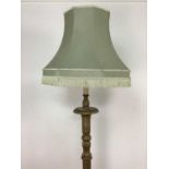 A REPRODUCTION GILTWOOD STANDARD LAMP