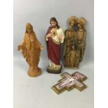 A STATUE OF JESUS CHRIST AND OTHER FIGURES