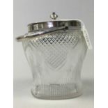 A SILVER MOUNTED CRYSTAL BISCUIT BARREL ALONG WITH A BRASS MORTAR AND PESTLE