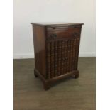 A MAHOGANY CABINET AND A FILING CABINET