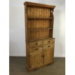 A STAINED WOOD DRESSER