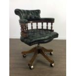 A REPRODUCTION MAHOGANY CAPTAINS CHAIR