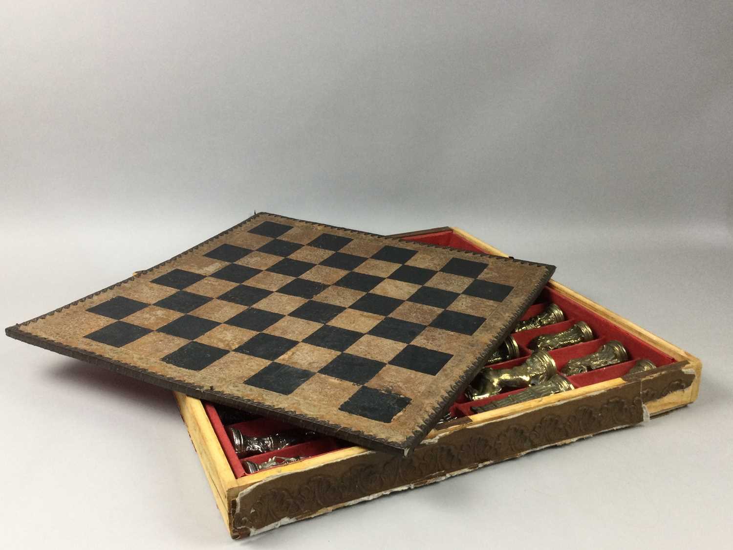 A CAST METAL FIGURAL CHESS SET