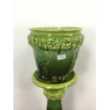 A VICTORIAN GREEN JARDINIERE AND STAND