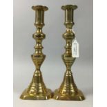 A PAIR OF 20TH CENTURY BRASS CANDLESTICKS AND TWO MINIATURE JUGS