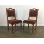 A SET OF EIGHT EARLY 20TH CENTURY OAK DINING CHAIRS