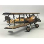 TWO WOOD MODELS OF AIRCRAFT, A MODEL HELICOPTER AND OTHER ITEMS