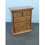 AN APPRENTICE PINE CHEST OF FIVE DRAWERS