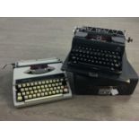 AN OLYMPIA TYPEWRITER AND TWO OTHERS