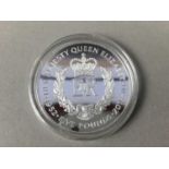 TWELVE CROWN SIZED ENCAPSULATED COINS, CASED