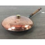 A COPPER WARMING PAN BY THOMSON, CRIEFF & LUNS AND A LARGE BRASS PAN