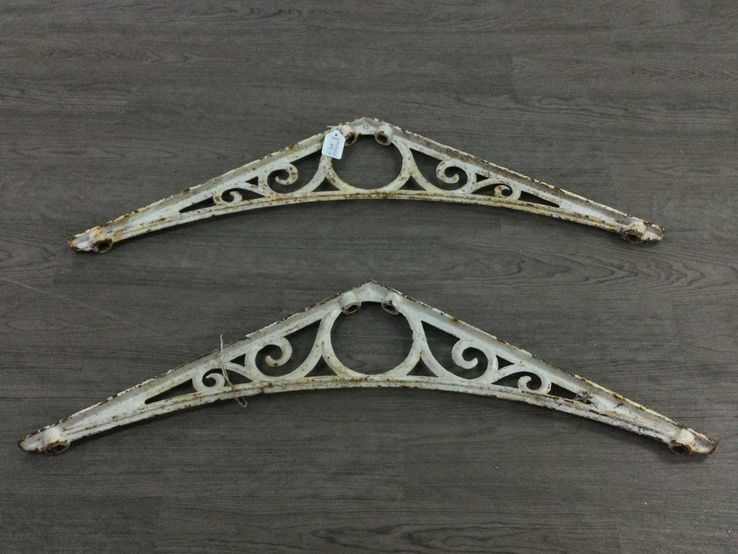 A SET OF NINE VICTORIAN CAST IRON BRACKETS