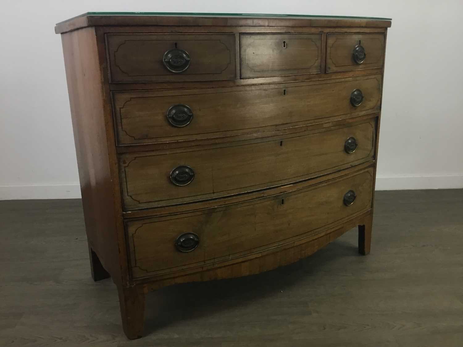 A GEORGIAN MAHOGANY BOW FRONTED CHEST OF DRAWERS