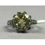 A LEMON QUARTZ AND DIAMOND RING