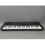 A YAMAHA PORTASOUND MK-100 KEYBOARD