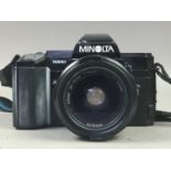 A MINOLTA 70-210 1:4 ZOOM LENS AND FURTHER CAMERAS AND EQUIPTMENT