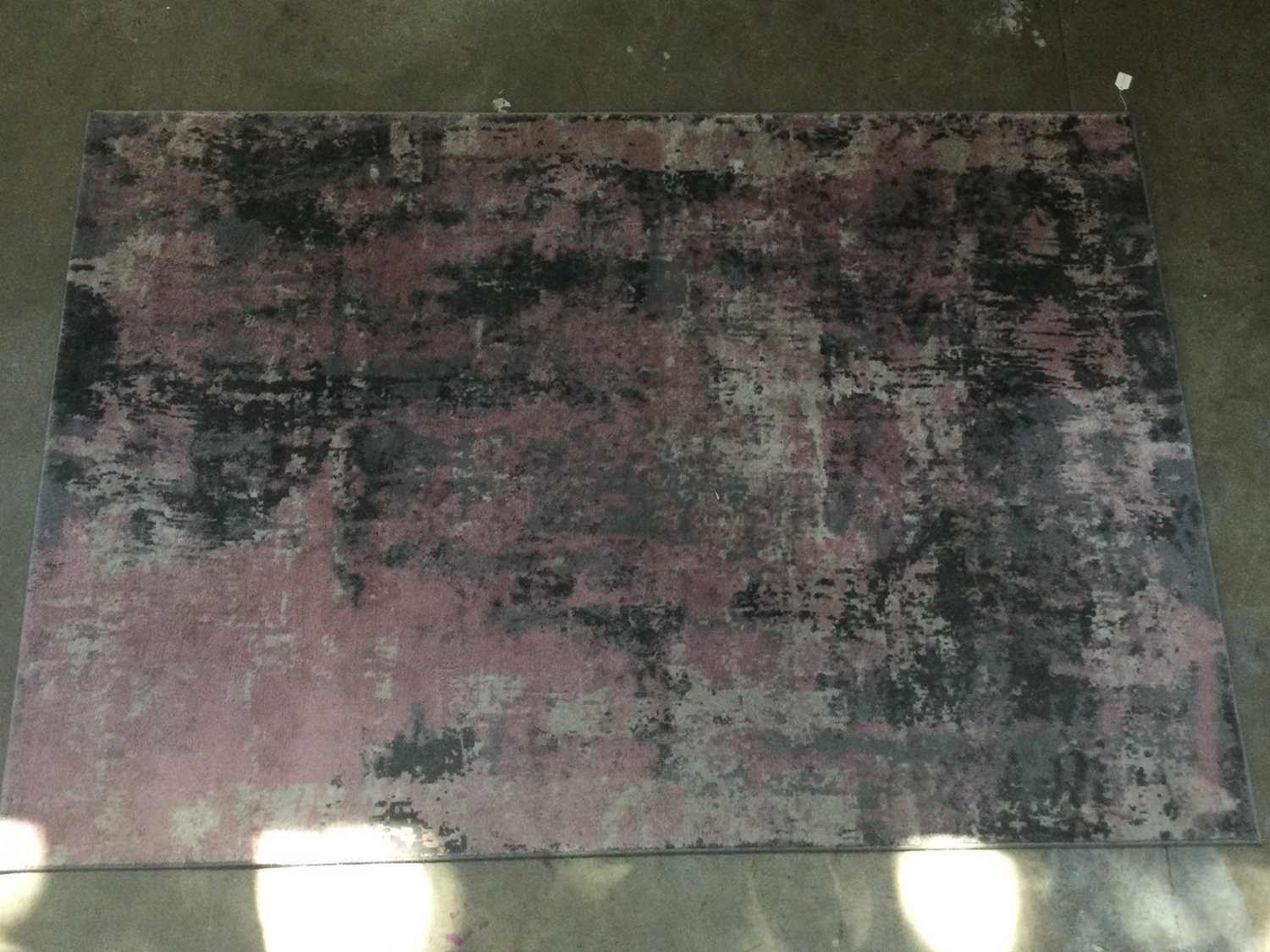 A LARGE MODERN PINK AND GREY RUG