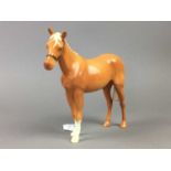 A BESWICK HORSE AND TWO OTHER FIGURES
